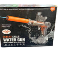Box of a desert eagle water gun with orange nozzle on a blue surface
