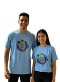 Two people wearing blue 'Happy Holi' t-shirts standing next to each other.